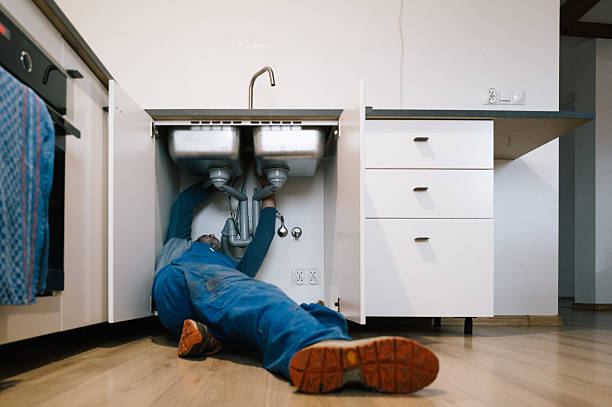 Professional Drain Cleaning technician working in Hamshire, TX